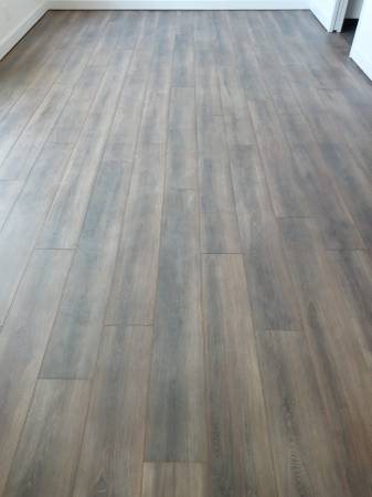 Grey toned laminate plank flooring